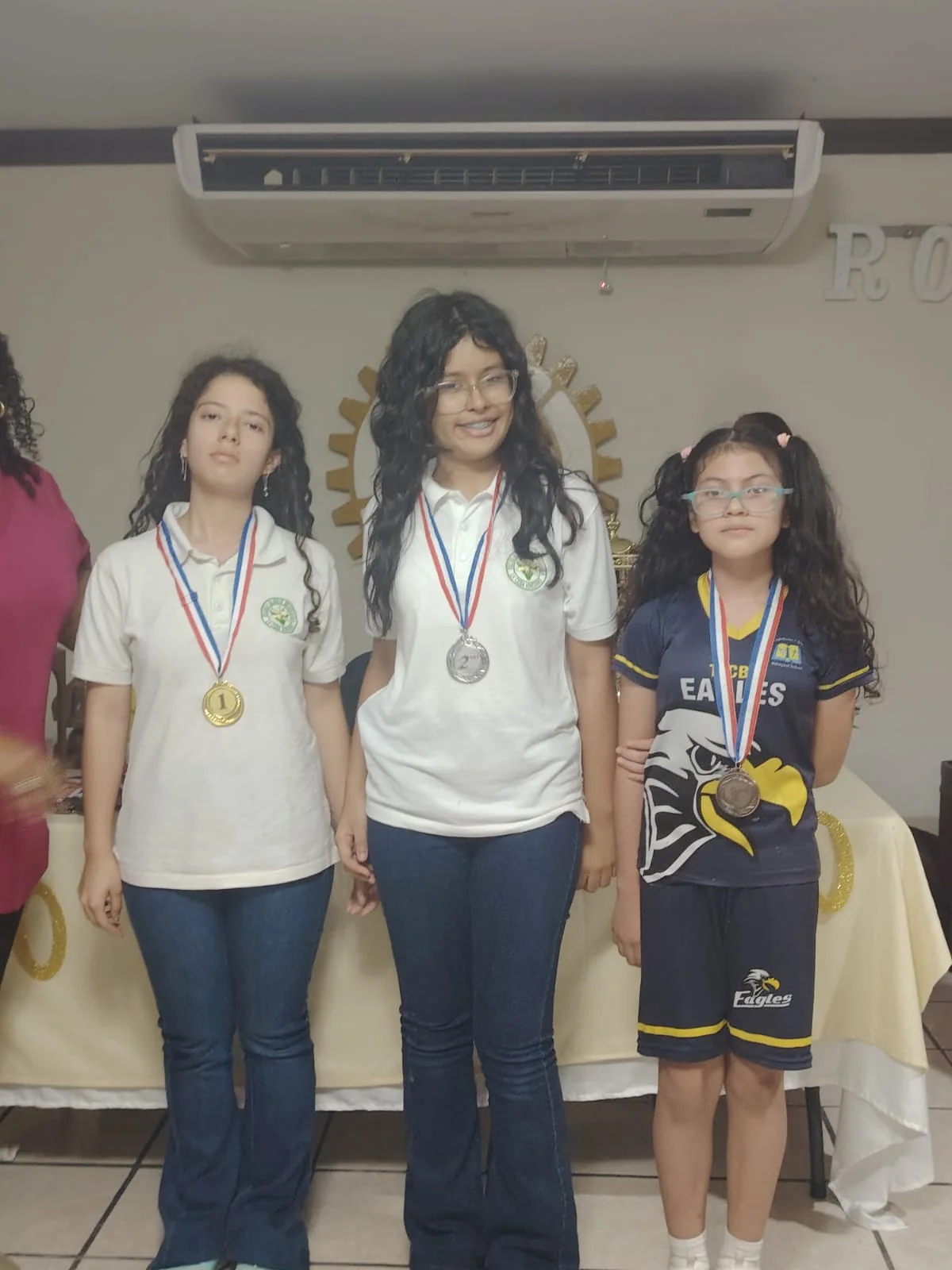 Students receiving medals at a chess tournament