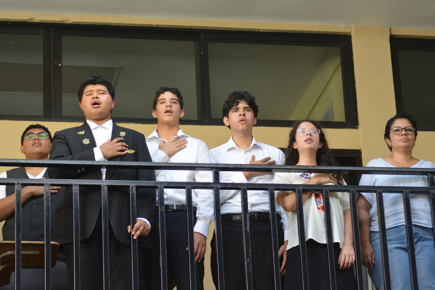 Students participating in one of the civic moments of the morning.