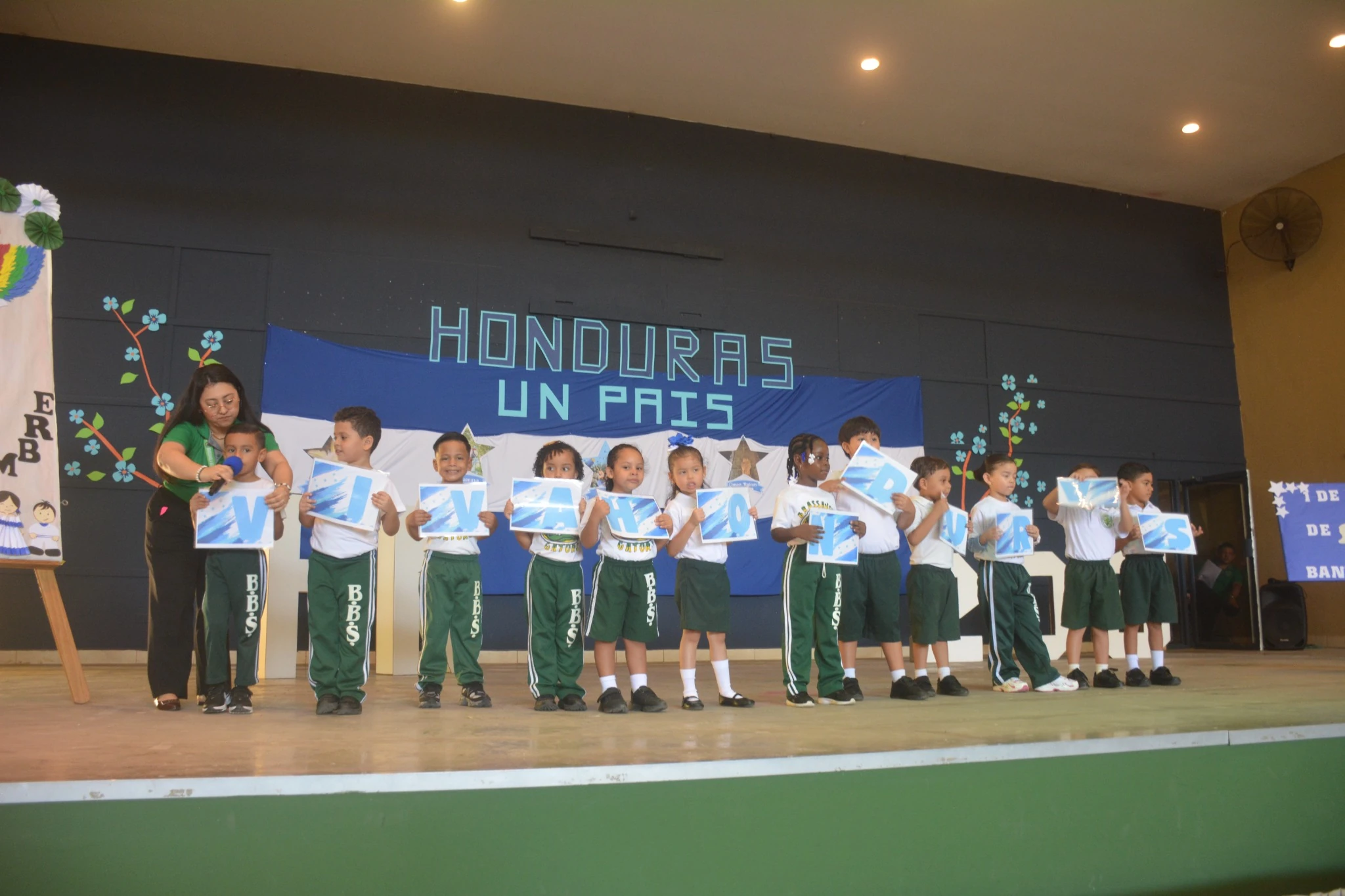 Students celebrating with flags