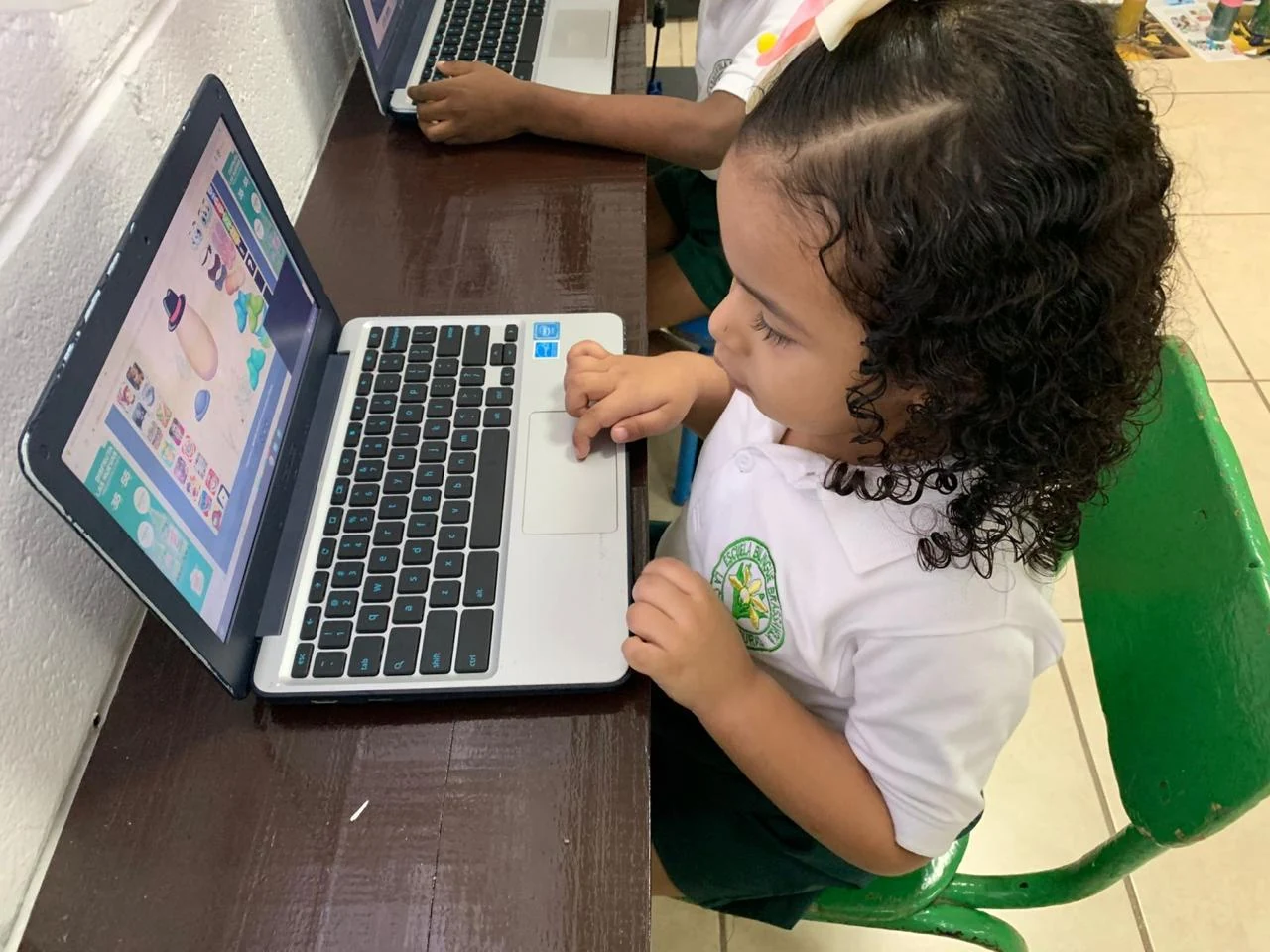 Preschool student using a computer